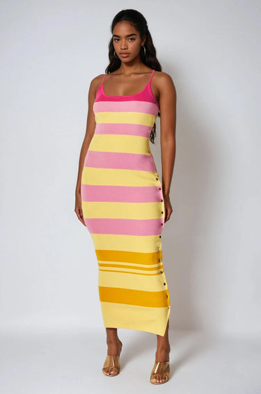 Fitted striped maxi dress with spaghetti straps and soft stretch fabric.